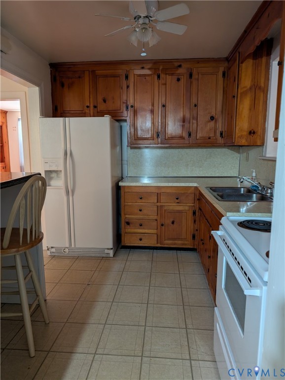 5915 Ridge Road Richmond, VA 23227 - Photo 7 of 17 a kitchen with a cabinets and appliances