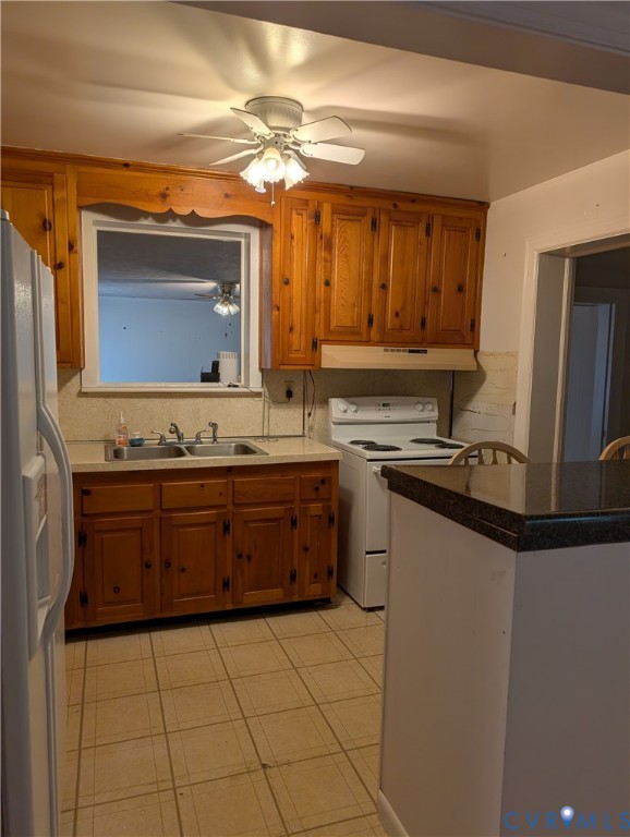 5915 Ridge Road Richmond, VA 23227 - Photo 9 of 17 a kitchen with stainless steel appliances a sink and a microwave