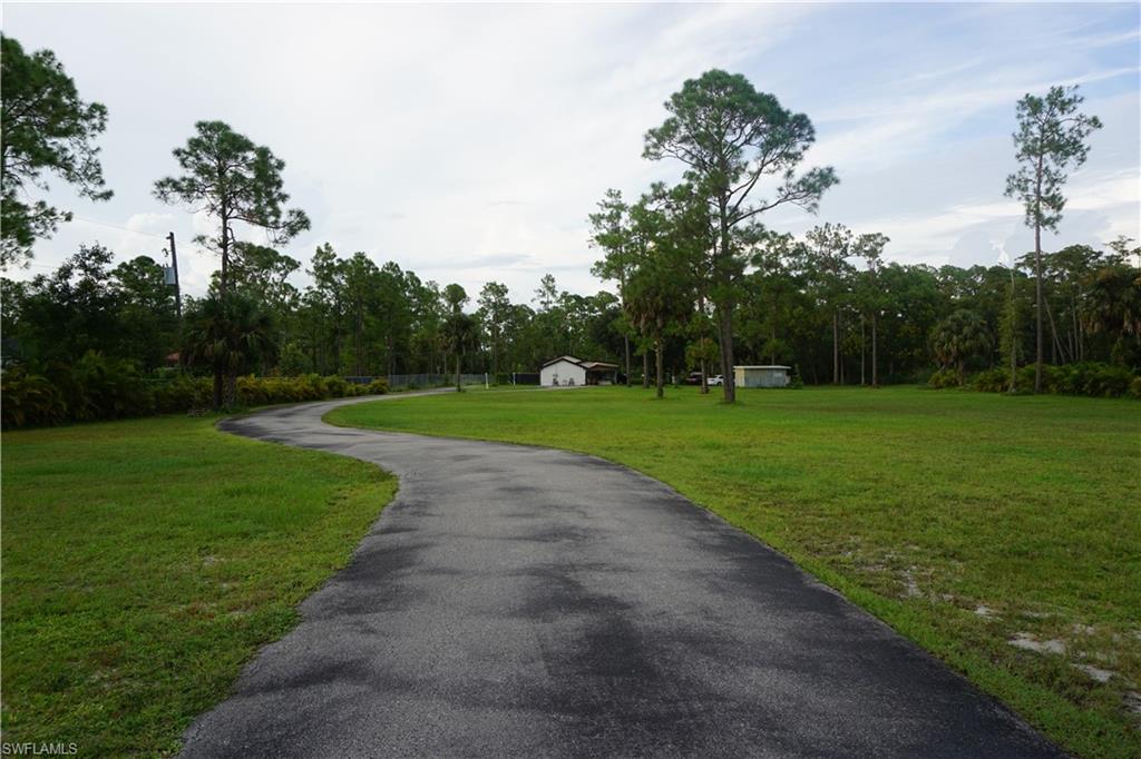 2407 Randall Boulevard Naples, FL 34120 - Photo 2 of 46 a view of a golf course
