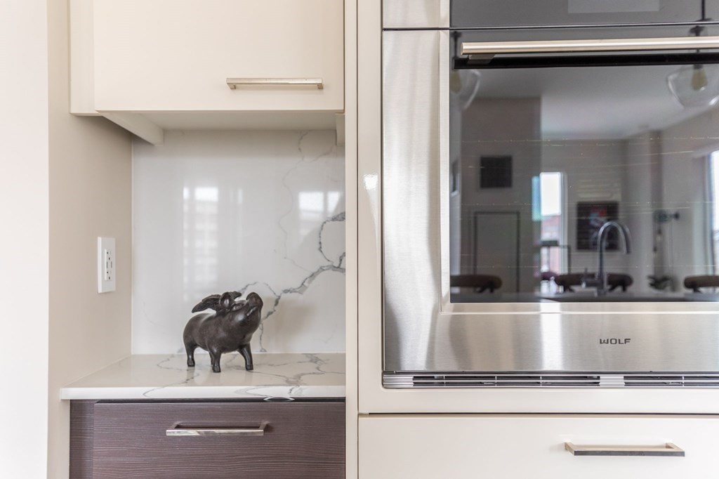 110 Broad Street, Unit 501 Boston, MA 02110 - Photo 24 of 41 a view of living room with cabinets