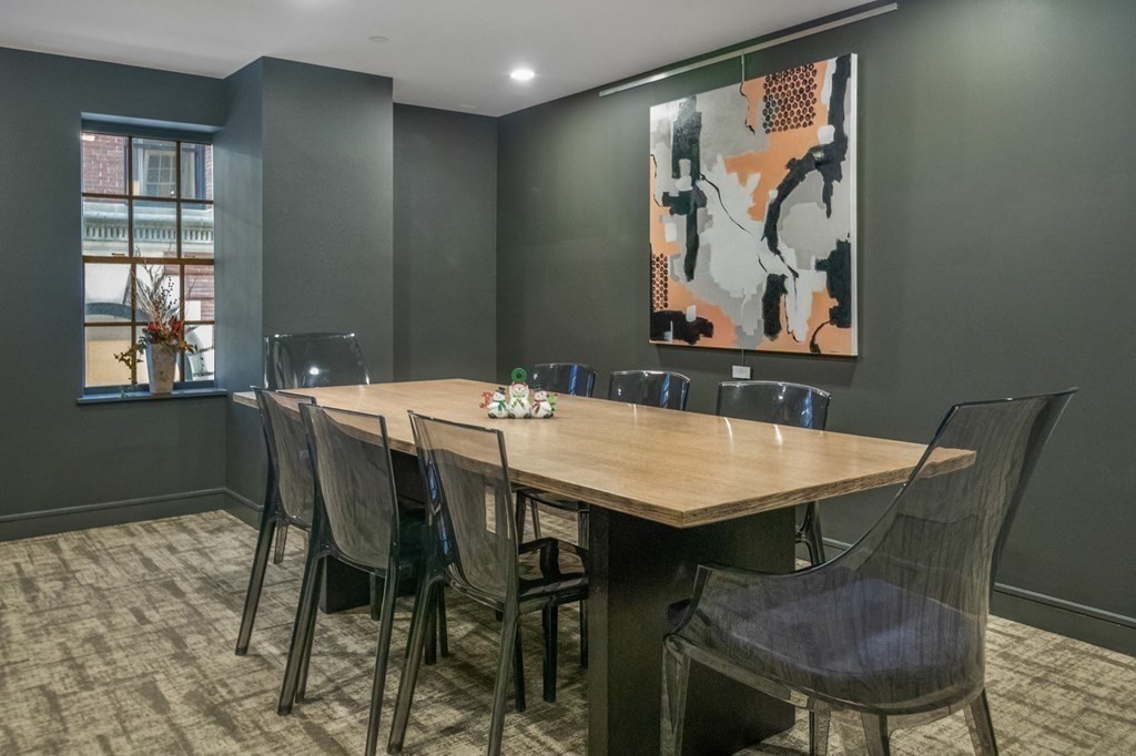 110 Broad Street, Unit 501 Boston, MA 02110 - Photo 34 of 41 a view of a dining room with furniture