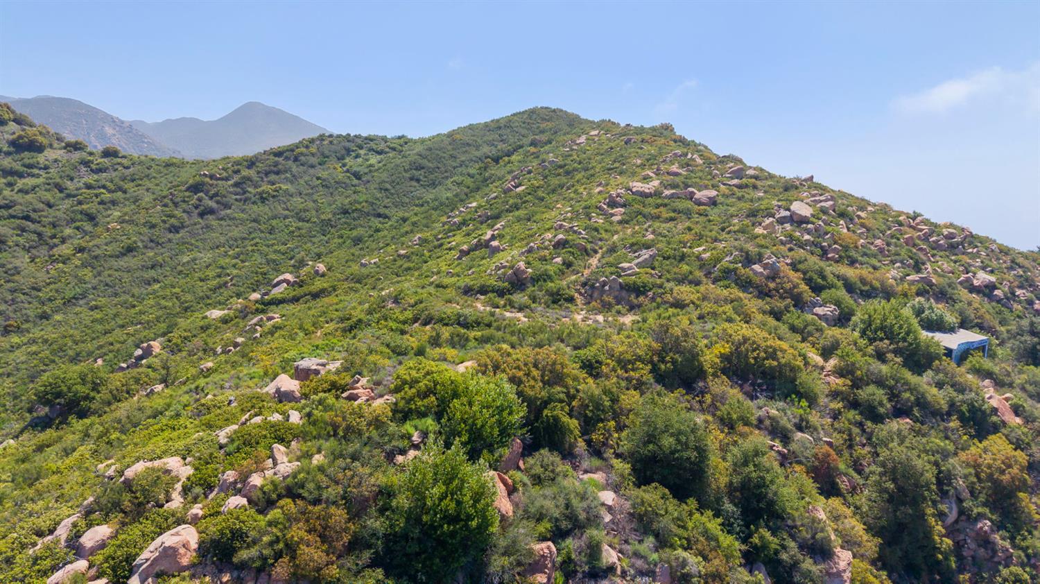 2888 Gibraltar Road Santa Barbara, CA 93105 - Photo 15 of 24 a view of a large building with a mountain in the background