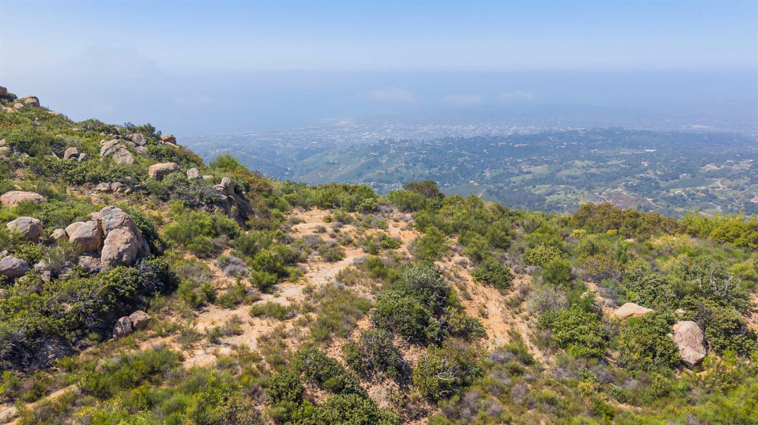 2888 Gibraltar Road Santa Barbara, CA 93105 - Photo 16 of 24 a view of a field with plants and trees