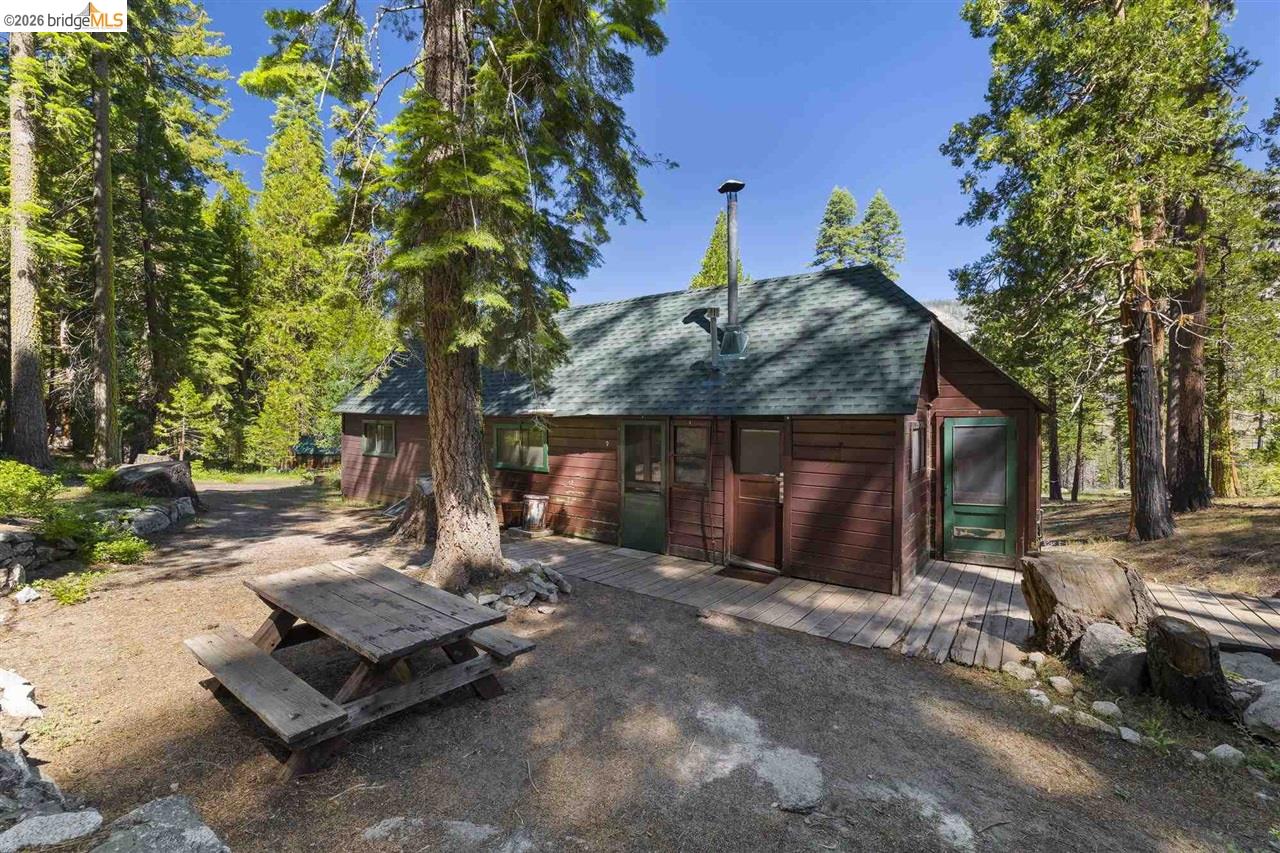 7 Riverside Tract Kyburz, CA 95720 - Photo 19 of 25 a view of a house with a yard