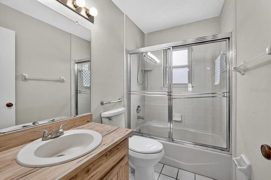 16 Fox Hollow Drive Ormond Beach, FL 32174 - Photo 19 of 38 a bathroom with a sink toilet and shower