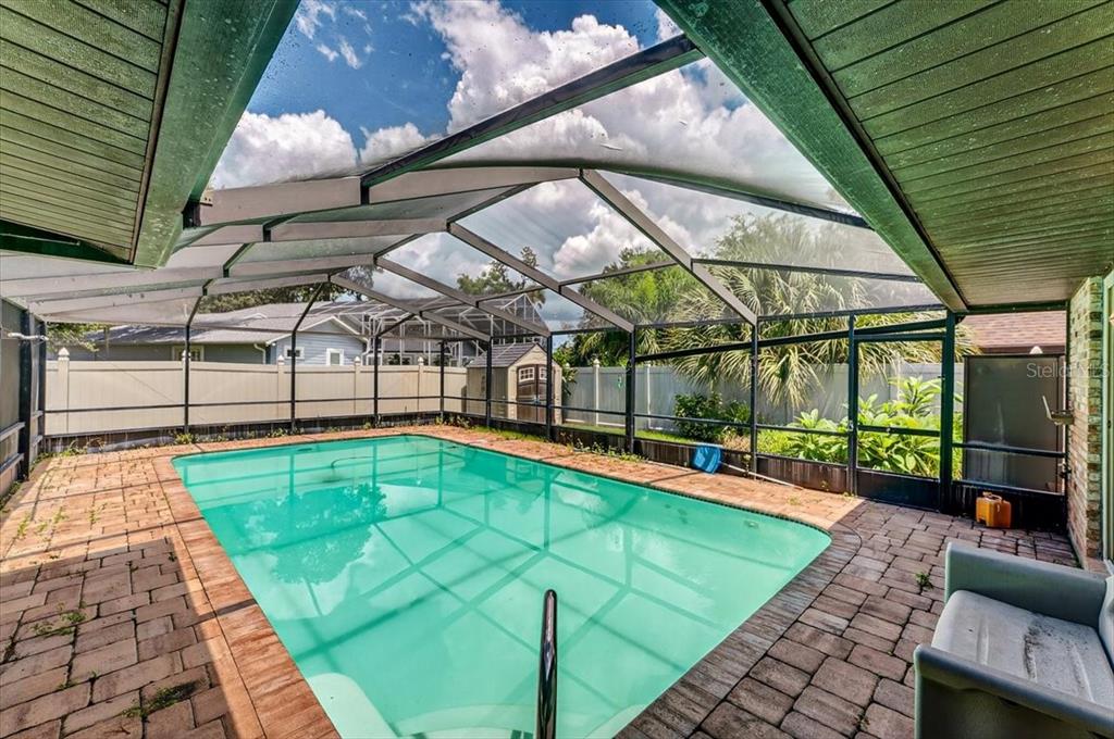 16 Fox Hollow Drive Ormond Beach, FL 32174 - Photo 26 of 38 a view of a backyard with a patio