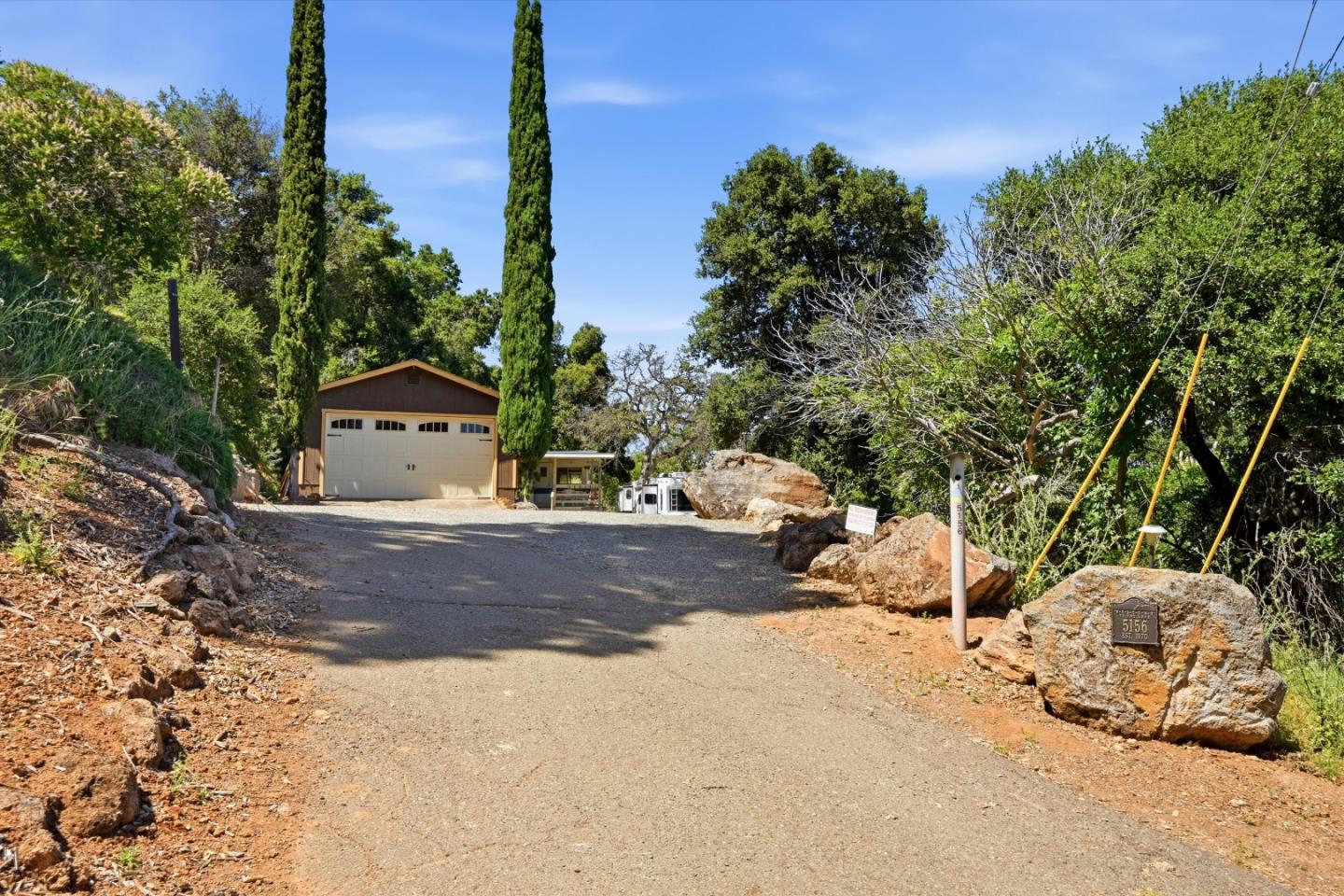 5156 Lake Road Lower Lake, CA 95457 - Photo 16 of 27 a view of a house with a yard