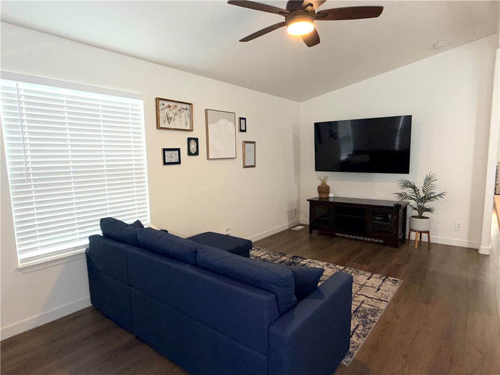 449 West Tefft Street, Unit 13 Nipomo, CA 93444 - Photo 3 of 22 a living room with furniture and a flat screen tv