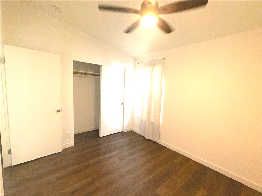 449 West Tefft Street, Unit 13 Nipomo, CA 93444 - Photo 7 of 22 a view of an empty room with wooden floor