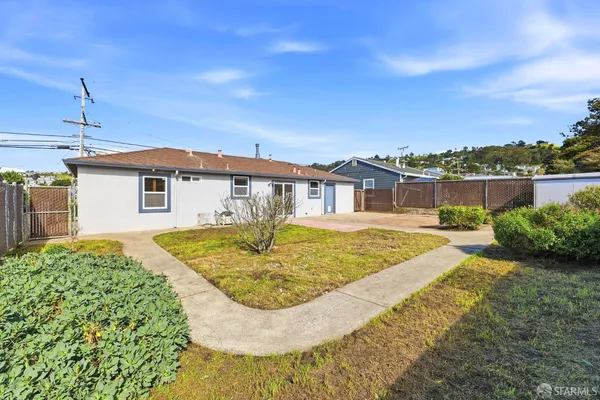 a view of a house with swimming pool