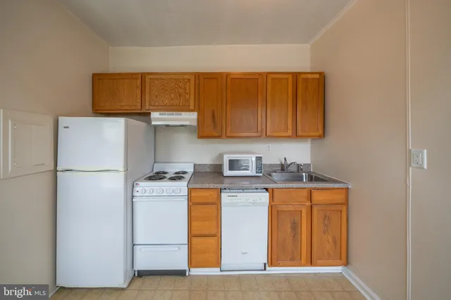 a utility room with washer and dryer
