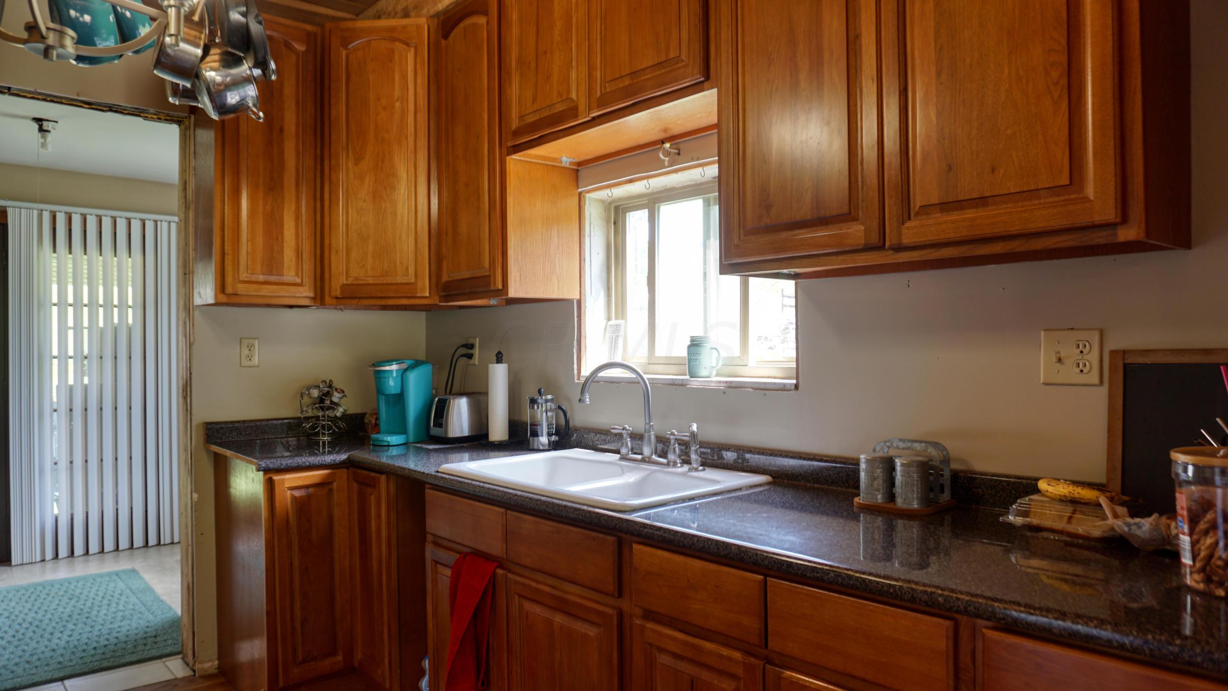 7477 Manila Road Cambridge, OH 43725 - Photo 28 of 58