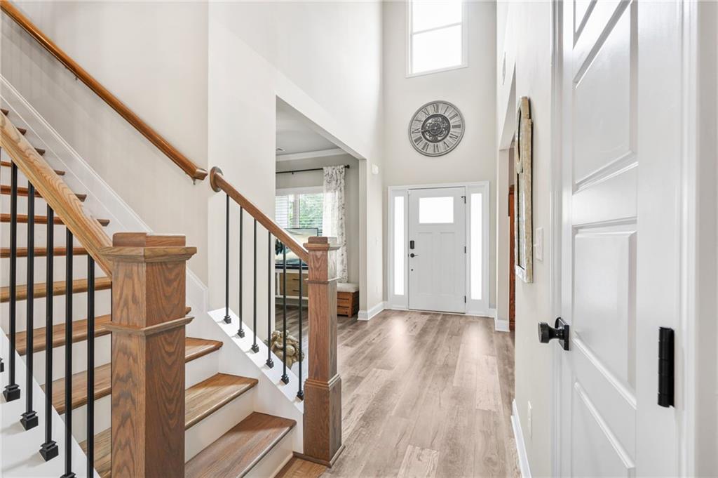 2326 Britt Street Grayson, GA 30017 - Photo 24 of 53 a view of a hallway with wooden floor and front door