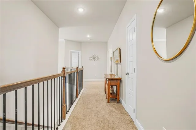 a view of a hallway with windows