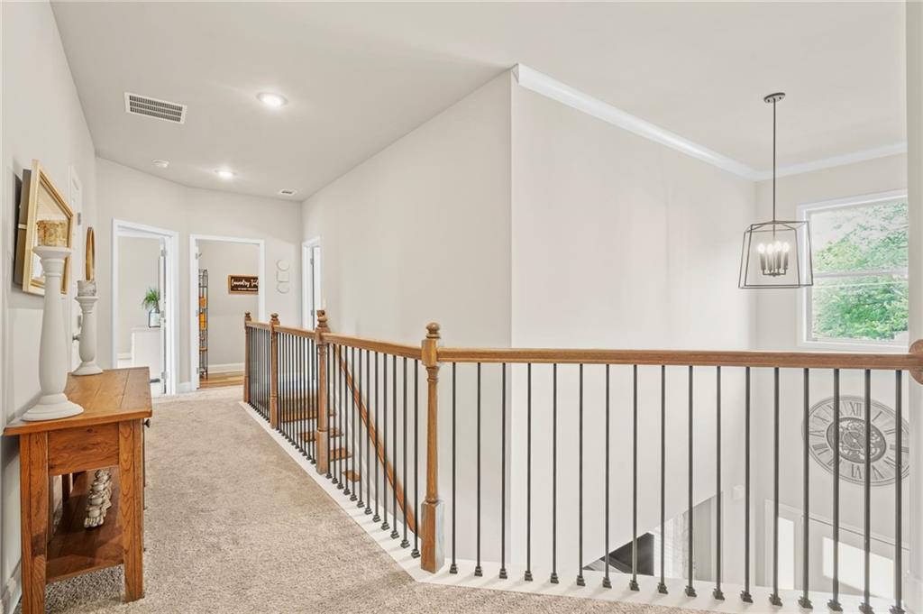 2326 Britt Street Grayson, GA 30017 - Photo 26 of 53 a view of a hallway with windows