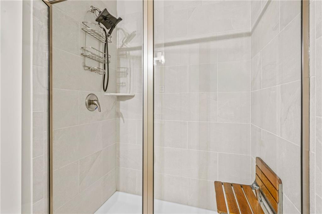 2326 Britt Street Grayson, GA 30017 - Photo 38 of 53 a bathroom with a shower