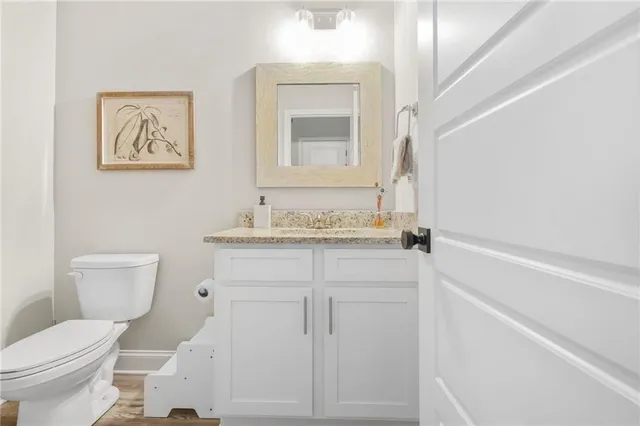 a bedroom with a bed and a table in it