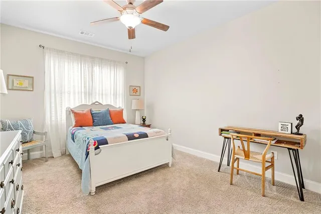 a bedroom with a bed and a cabinets