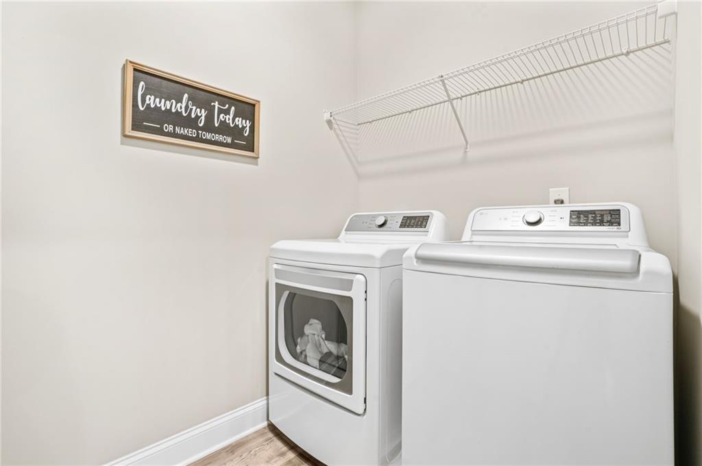 2326 Britt Street Grayson, GA 30017 - Photo 48 of 53 a utility room with dryer and washer