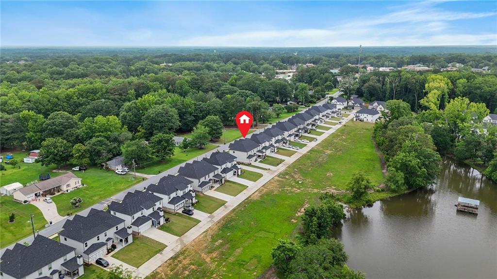 2326 Britt Street Grayson, GA 30017 - Photo 53 of 53 an aerial view of a house with a yard and lake view