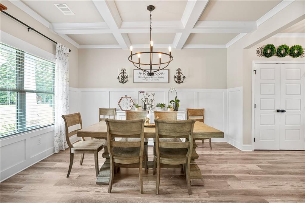 2326 Britt Street Grayson, GA 30017 - Photo 8 of 53 a view of a dining room with furniture window and wooden floor