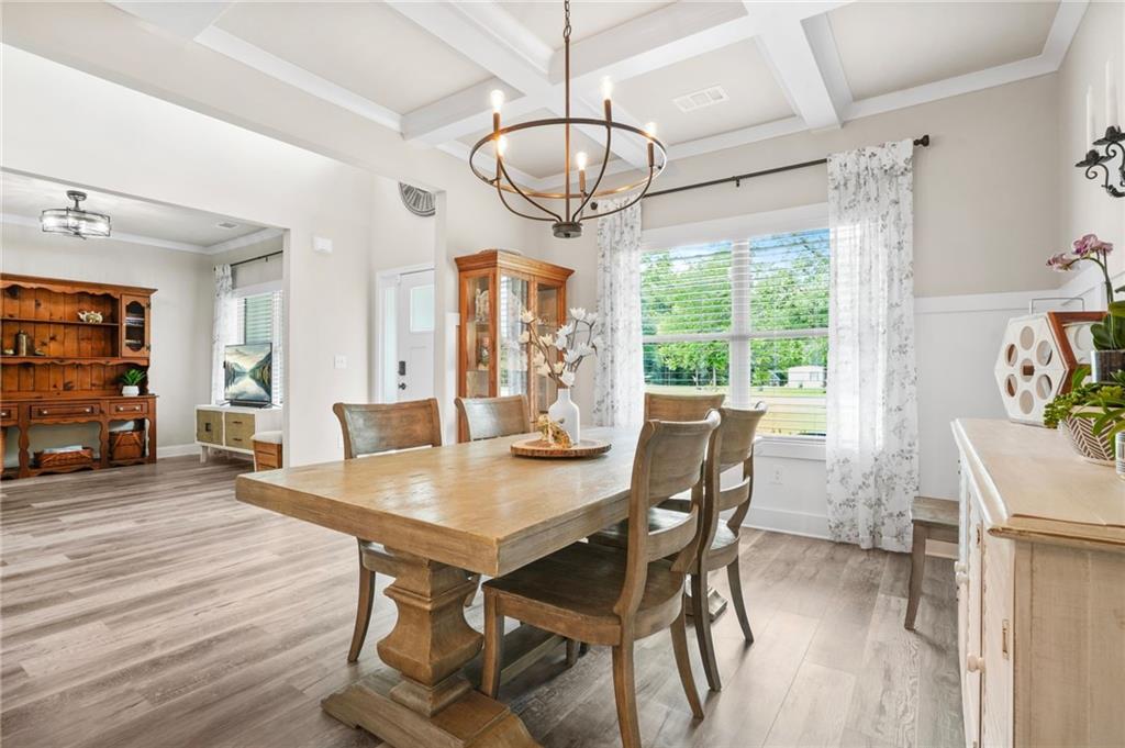 2326 Britt Street Grayson, GA 30017 - Photo 9 of 53 a view of a dining room with furniture window and wooden floor