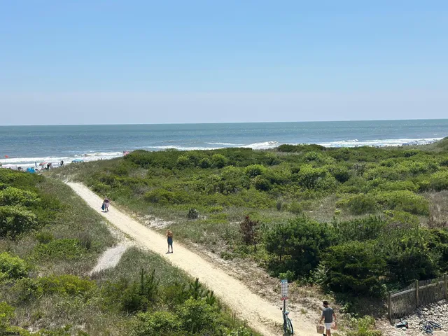 a room with a bed and a view of walk in closet
