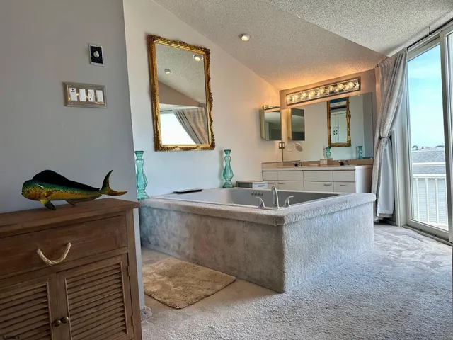 a view of a porch with a floor to ceiling window