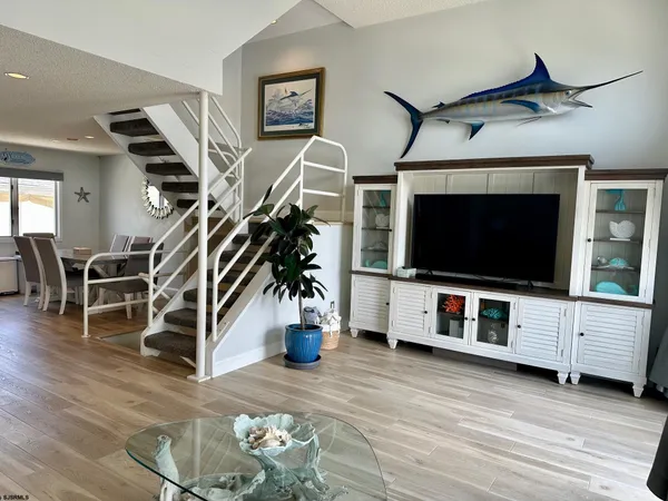 a room with a bed and a view of walk in closet