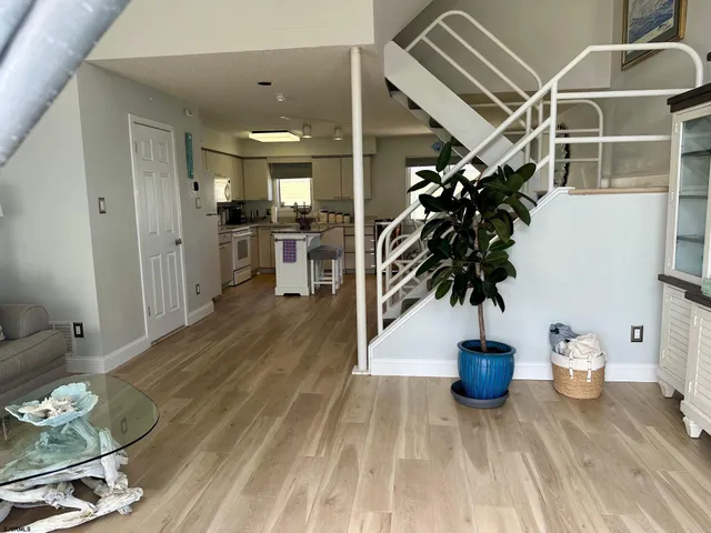 a view of a field with an ocean