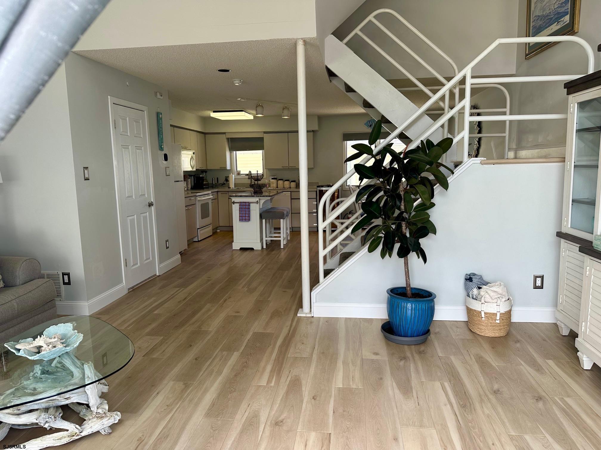 305 4th Street South, Unit 305 Brigantine, NJ 08203 - Photo 42 of 45 a view of an entryway with wooden floor