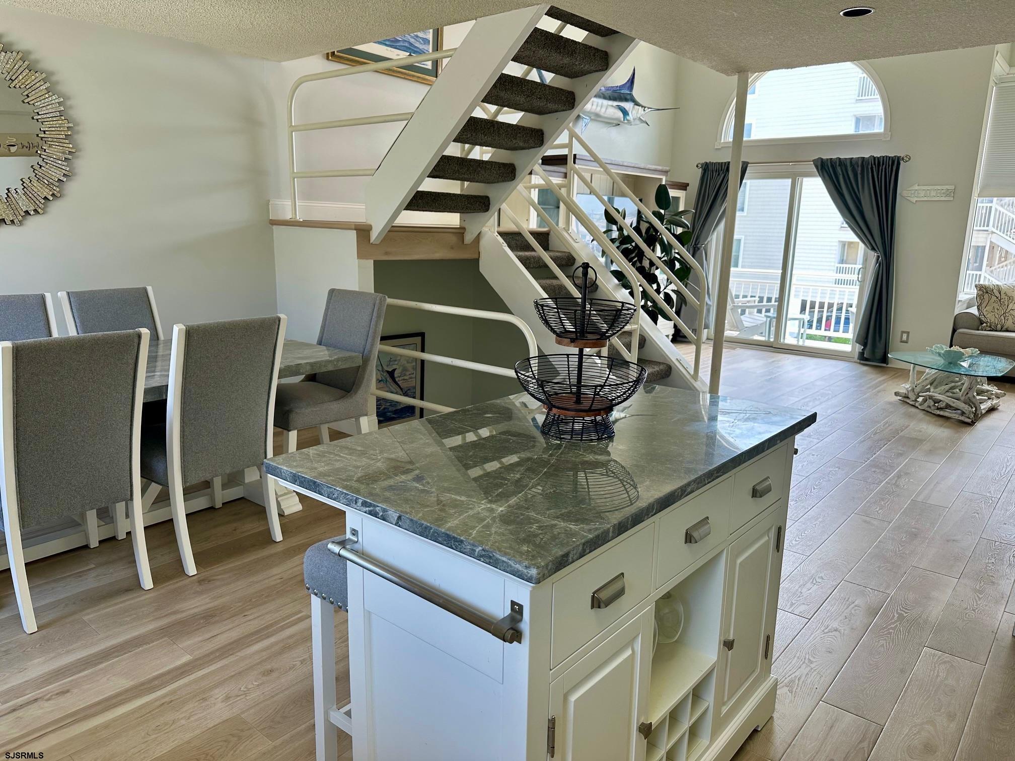 305 4th Street South, Unit 305 Brigantine, NJ 08203 - Photo 43 of 45 a view of entryway and hall with wooden floor