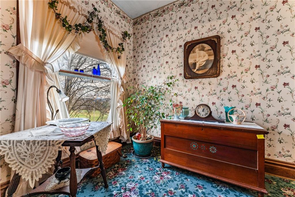 572 Mercer-New Wilmington Road Mercer, PA 16137 - Photo 27 of 39 a view of a room with a table and a chair