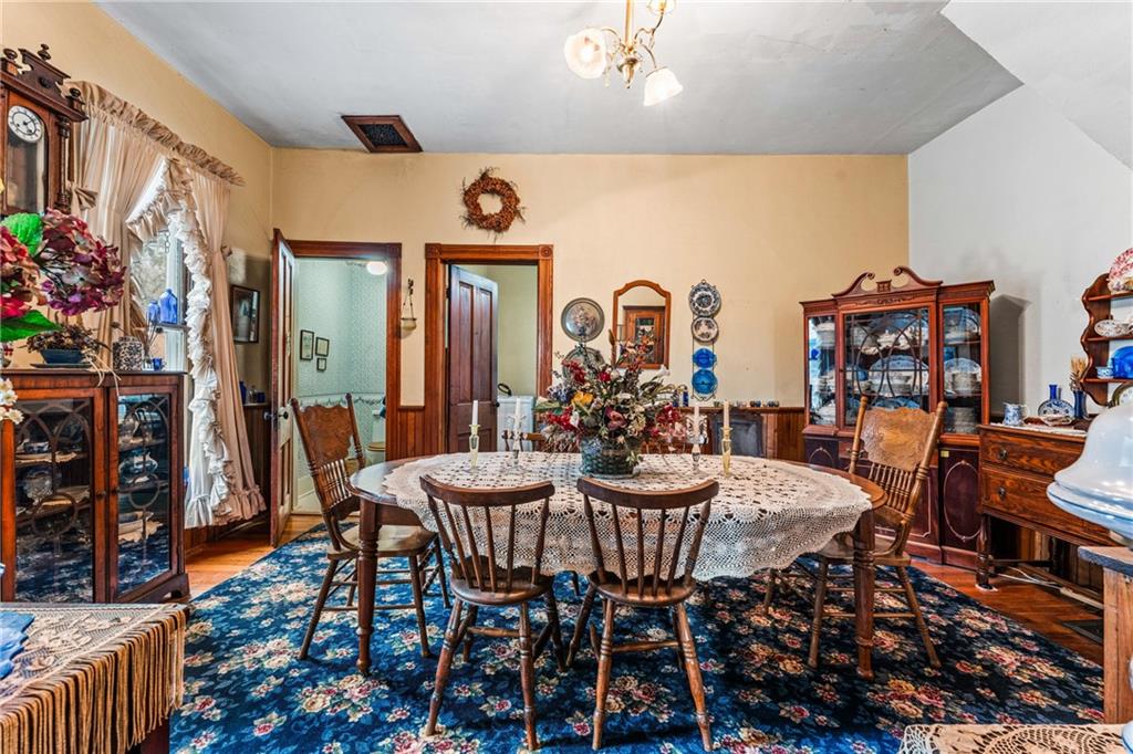 572 Mercer-New Wilmington Road Mercer, PA 16137 - Photo 10 of 39 a view of a dining room with furniture