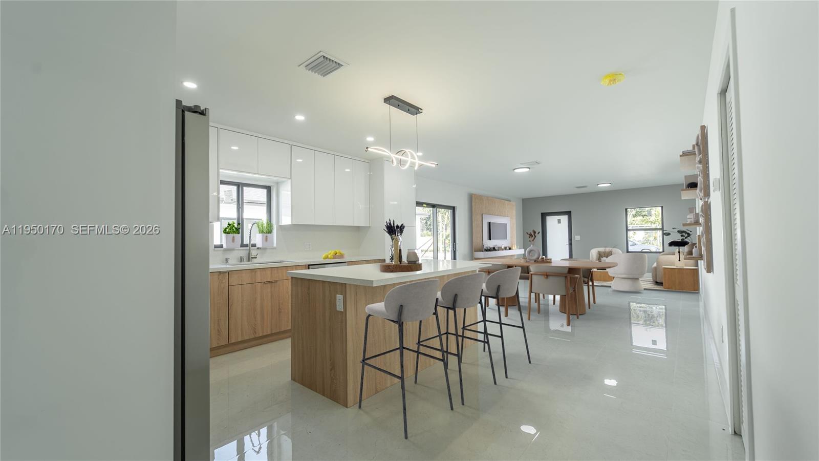 22840 Southwest 122nd Place Miami, FL 33170 - Photo 13 of 36 a view of a dining room with furniture