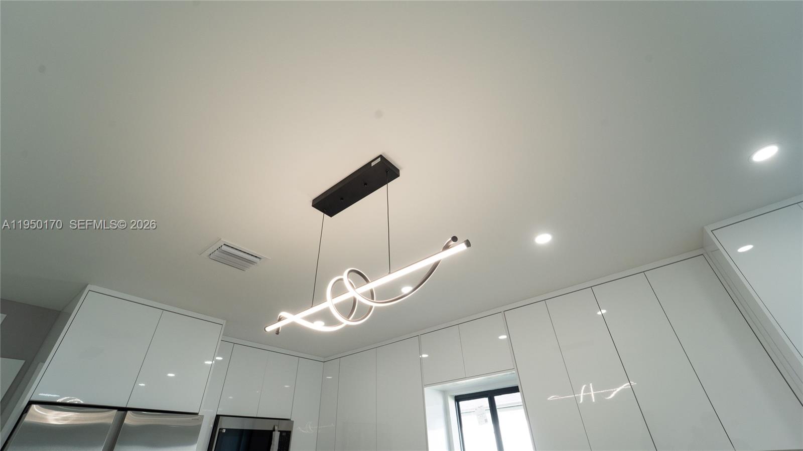 22840 Southwest 122nd Place Miami, FL 33170 - Photo 22 of 36 a ceiling fan in a room