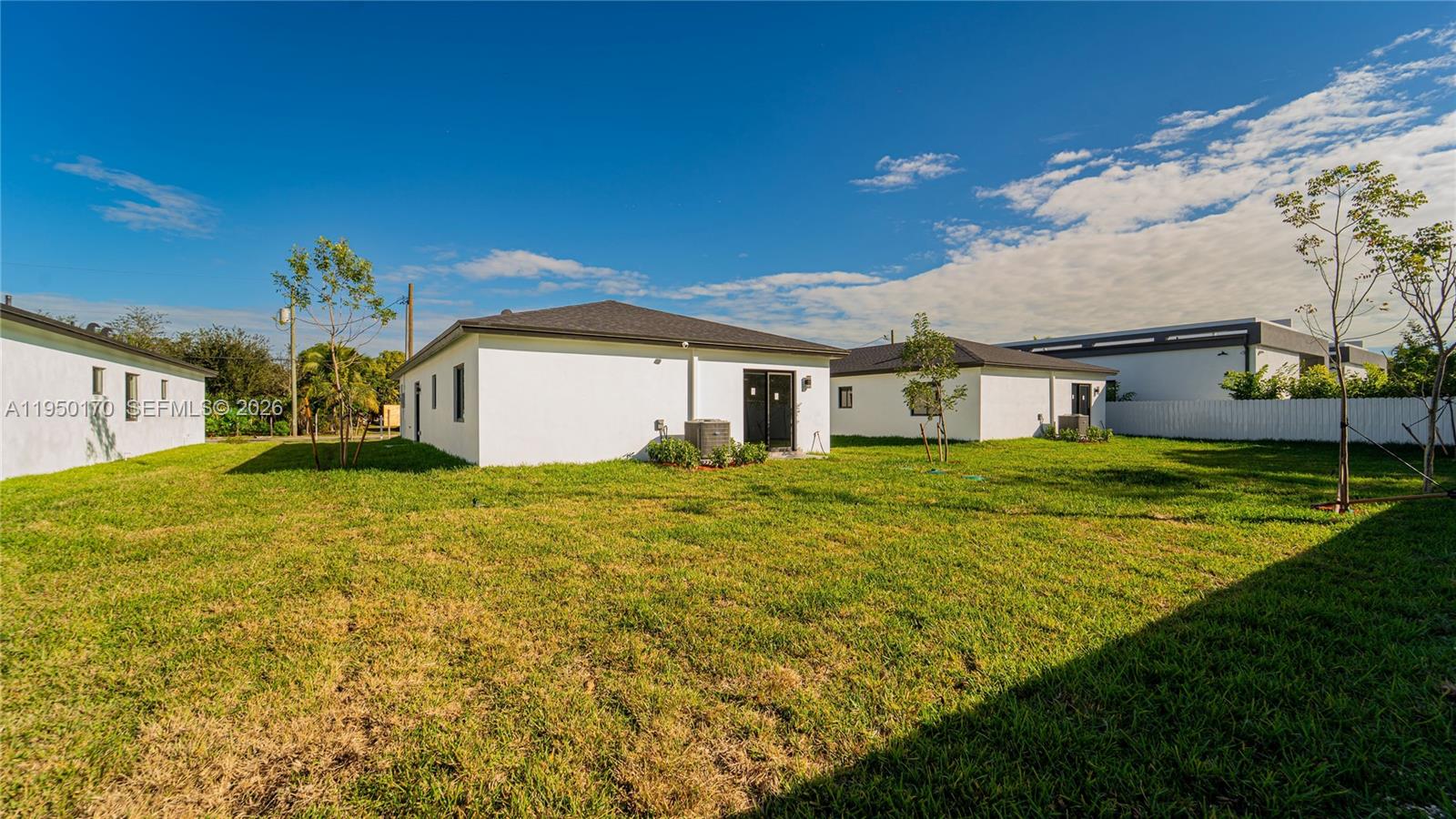 22840 Southwest 122nd Place Miami, FL 33170 - Photo 36 of 36 a house view with a garden space