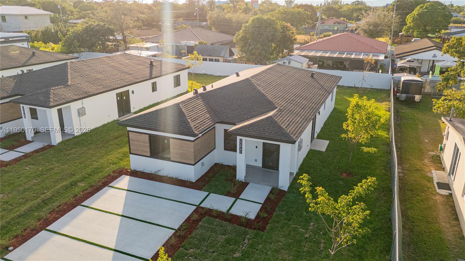 22840 Southwest 122nd Place Miami, FL 33170 - Photo 4 of 36 an aerial view of a house with a garden