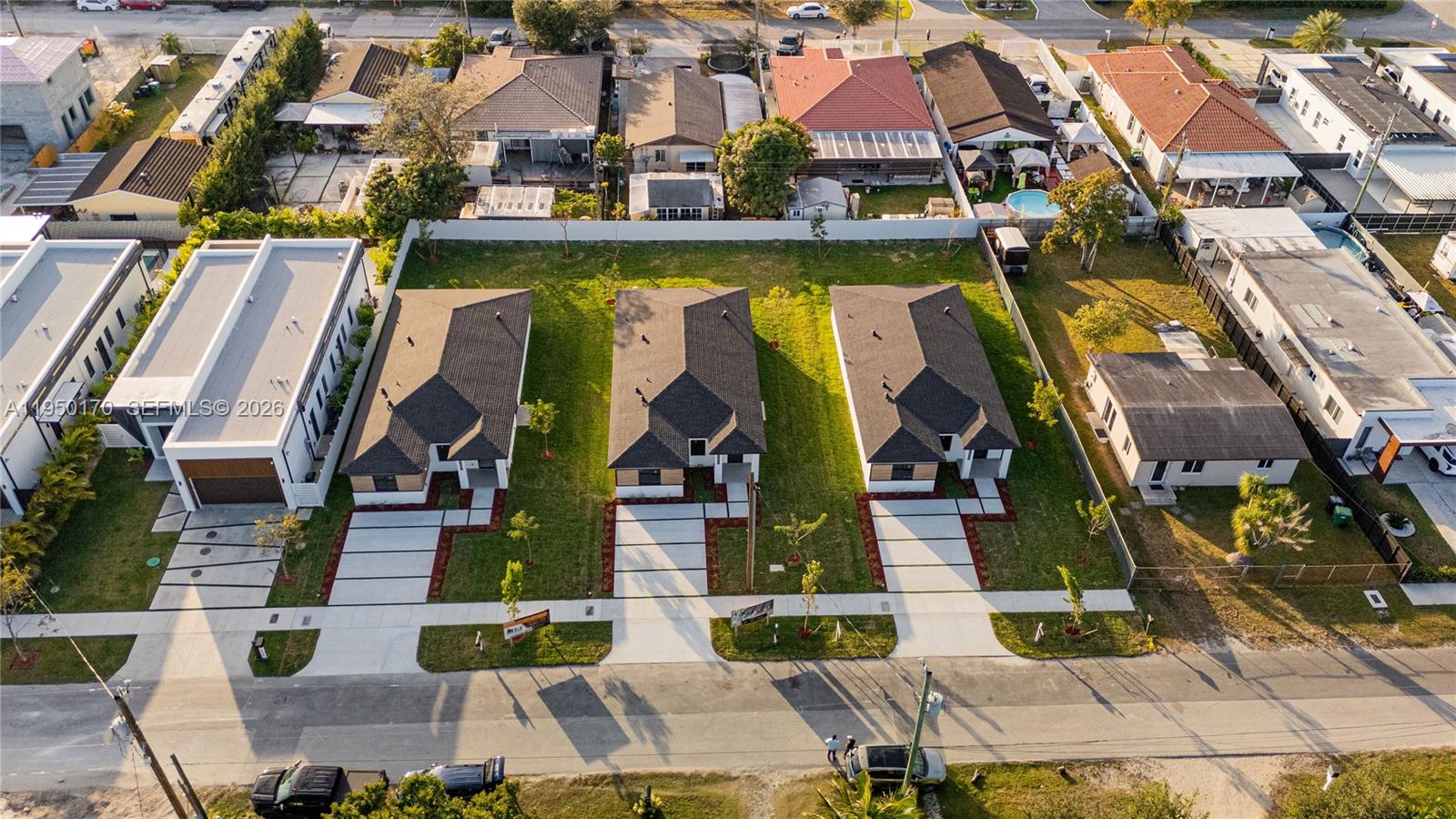 22840 Southwest 122nd Place Miami, FL 33170 - Photo 5 of 36 an aerial view of residential houses with outdoor space