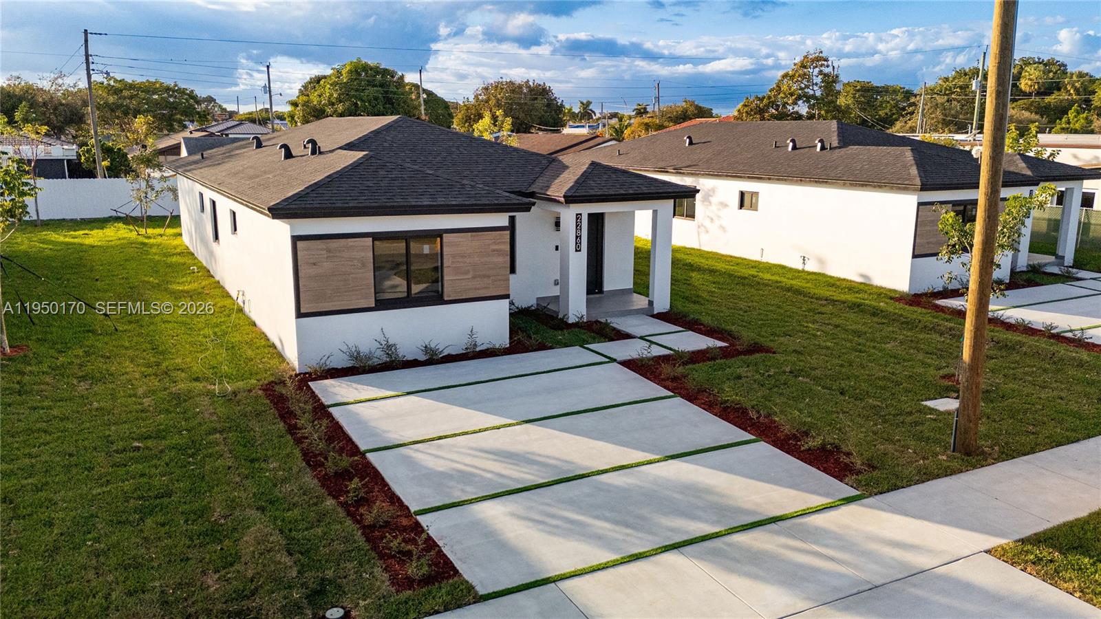 22840 Southwest 122nd Place Miami, FL 33170 - Photo 6 of 36 a aerial view of a house with a yard