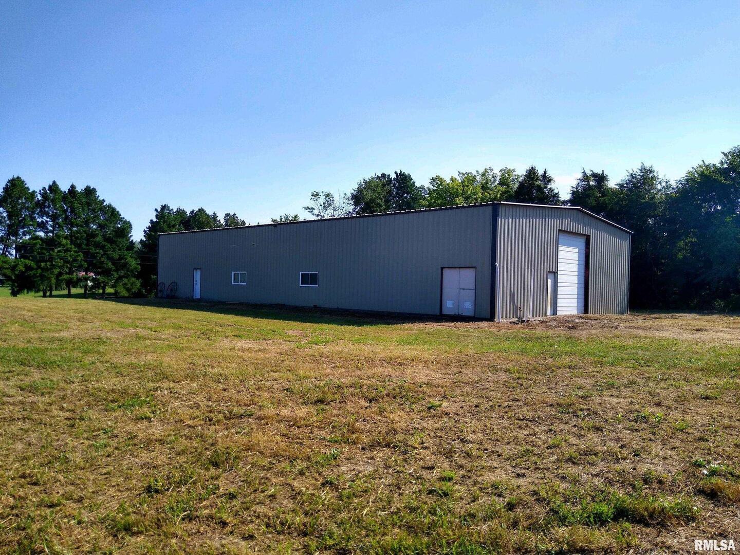 39 Bushwack Road Golconda, IL 62938 - Photo 1 of 28 a house view with a garden space