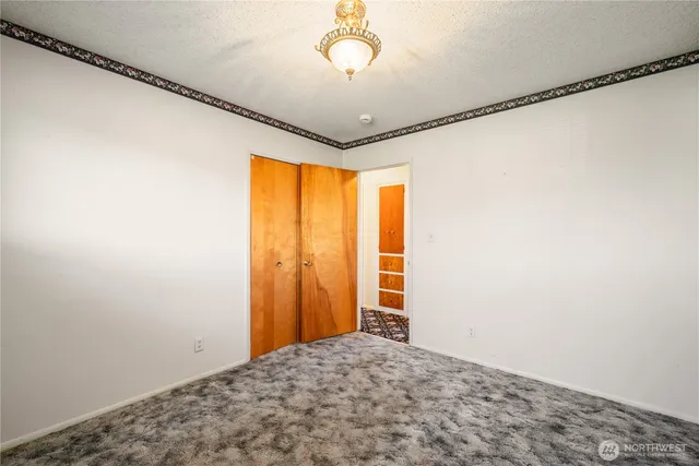 a view of a room with a large window