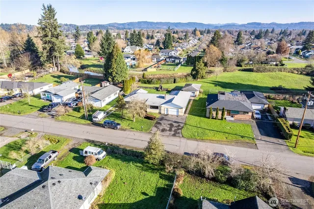 an aerial view of a house with a garden