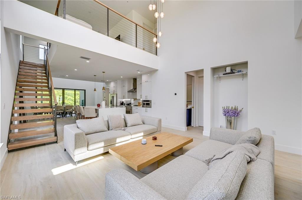 3400 Canal Street Naples, FL 34112 - Photo 6 of 34 a living room with furniture and a large window