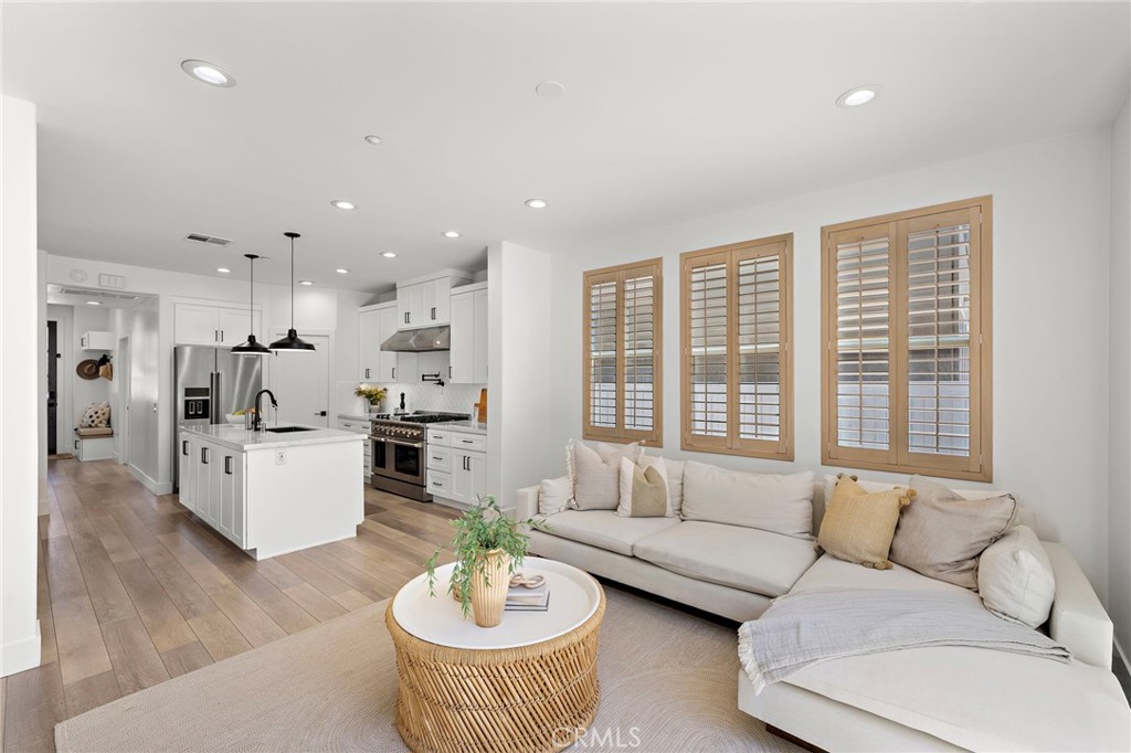 7 Bluewing Lane Ladera Ranch, CA 92694 - Photo 14 of 55 a living room with furniture and a large window