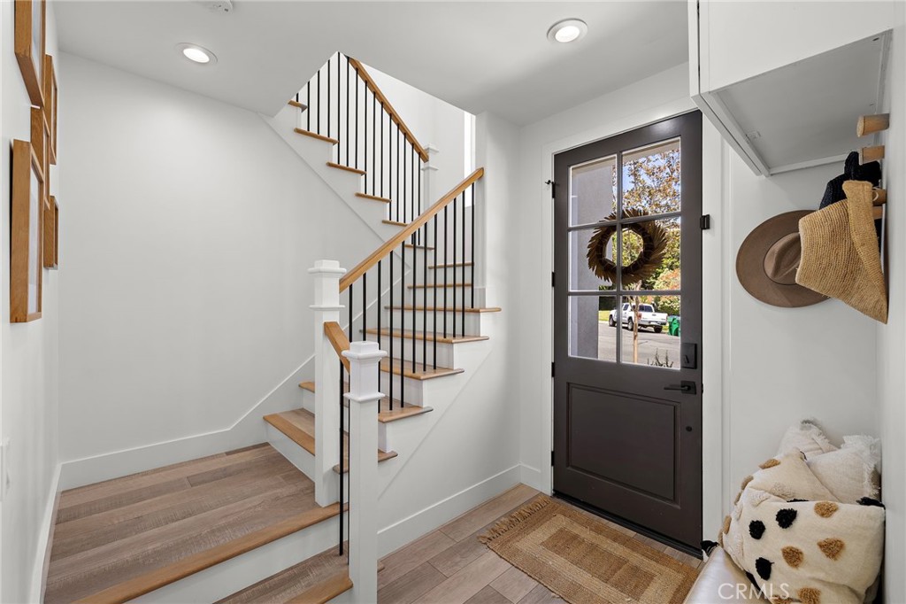 7 Bluewing Lane Ladera Ranch, CA 92694 - Photo 3 of 55 a view of entryway and hall with wooden floor