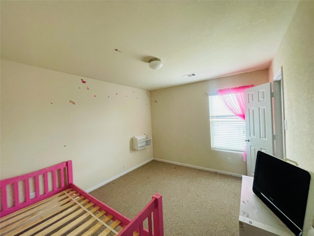 29311 Nectar Bloom Court Spring, TX 77386 - Photo 7 of 15 a workspace with furniture and a flat screen tv