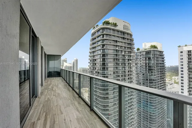 a view of a city with tall buildings