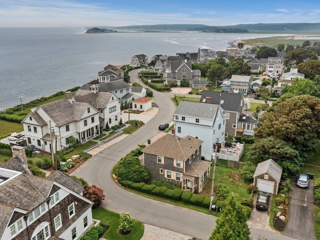 an aerial view of a house with outdoor space
