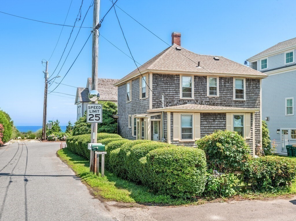 2 Collier Road Scituate, MA 02066 - Photo 11 of 41 a front view of a house with a yard